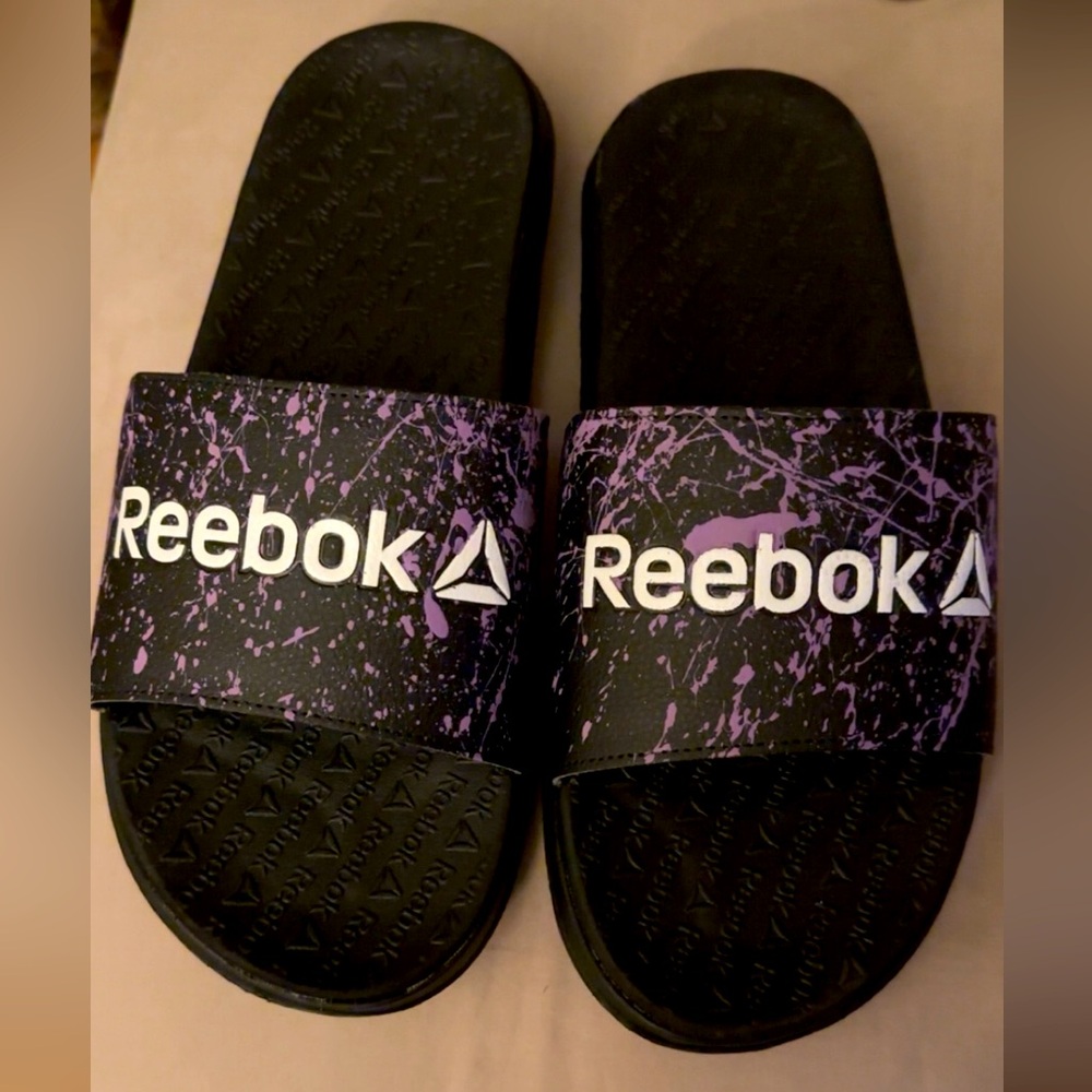 Brand new custom Reebok slides.